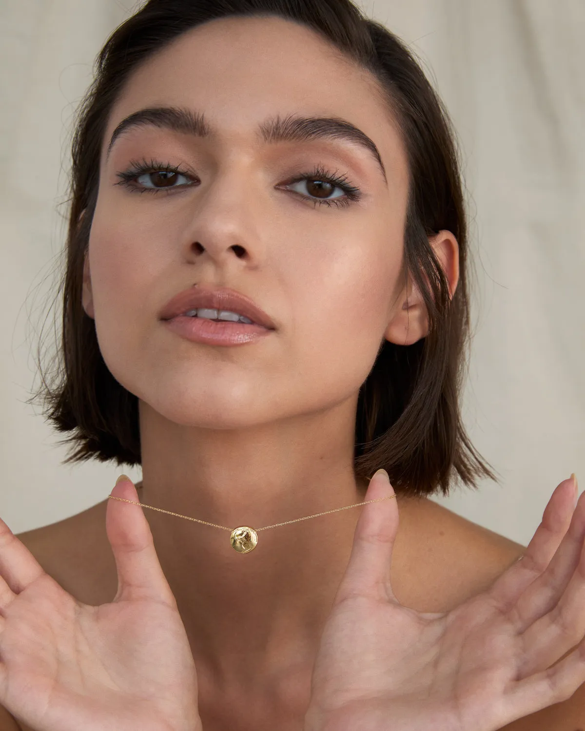 Us Against The World Icon Necklace